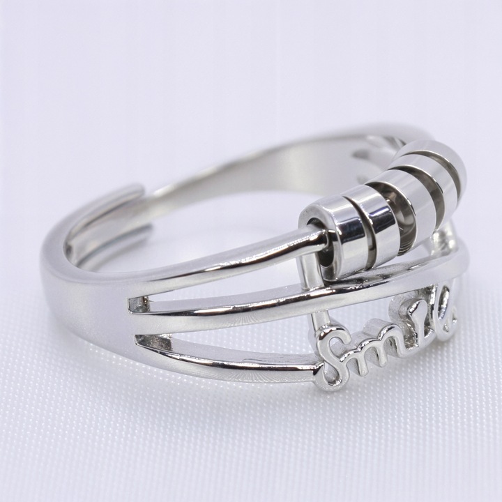 SREBRNY PIERŚCIONEK SMILE antystresowy stal chirurgiczna ruchome krążki