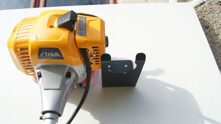 WIESZAK UCHWYT DO ŚCIANY MOCOWANIE DO KOSY SPALINOWEJ PODKASZARKI