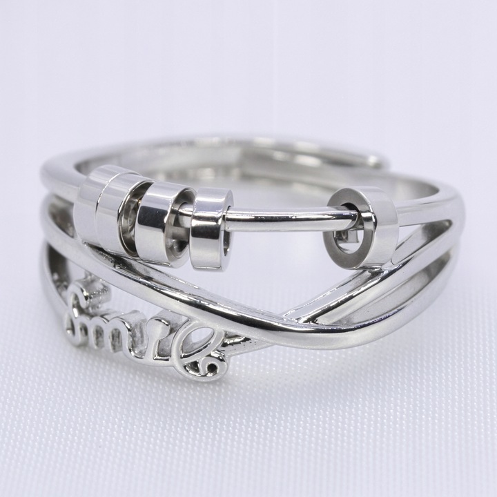 SREBRNY PIERŚCIONEK SMILE antystresowy stal chirurgiczna ruchome krążki