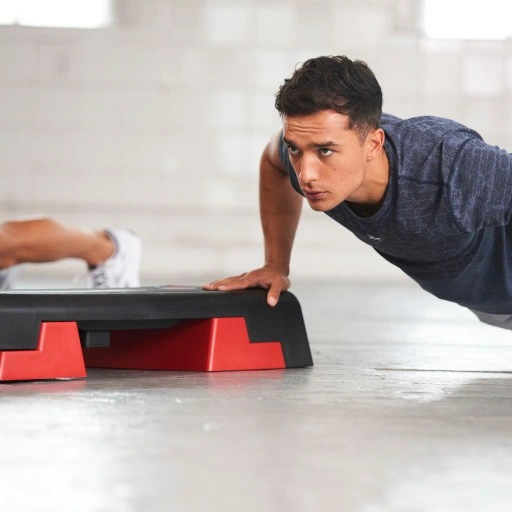 REEBOK STEP CZARNO-CZERWONY RAP-11150RD