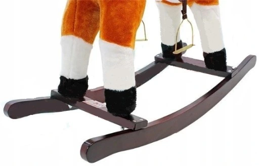 KOŃ NA BIEGUNACH śpiewa rusza się brązowy konik