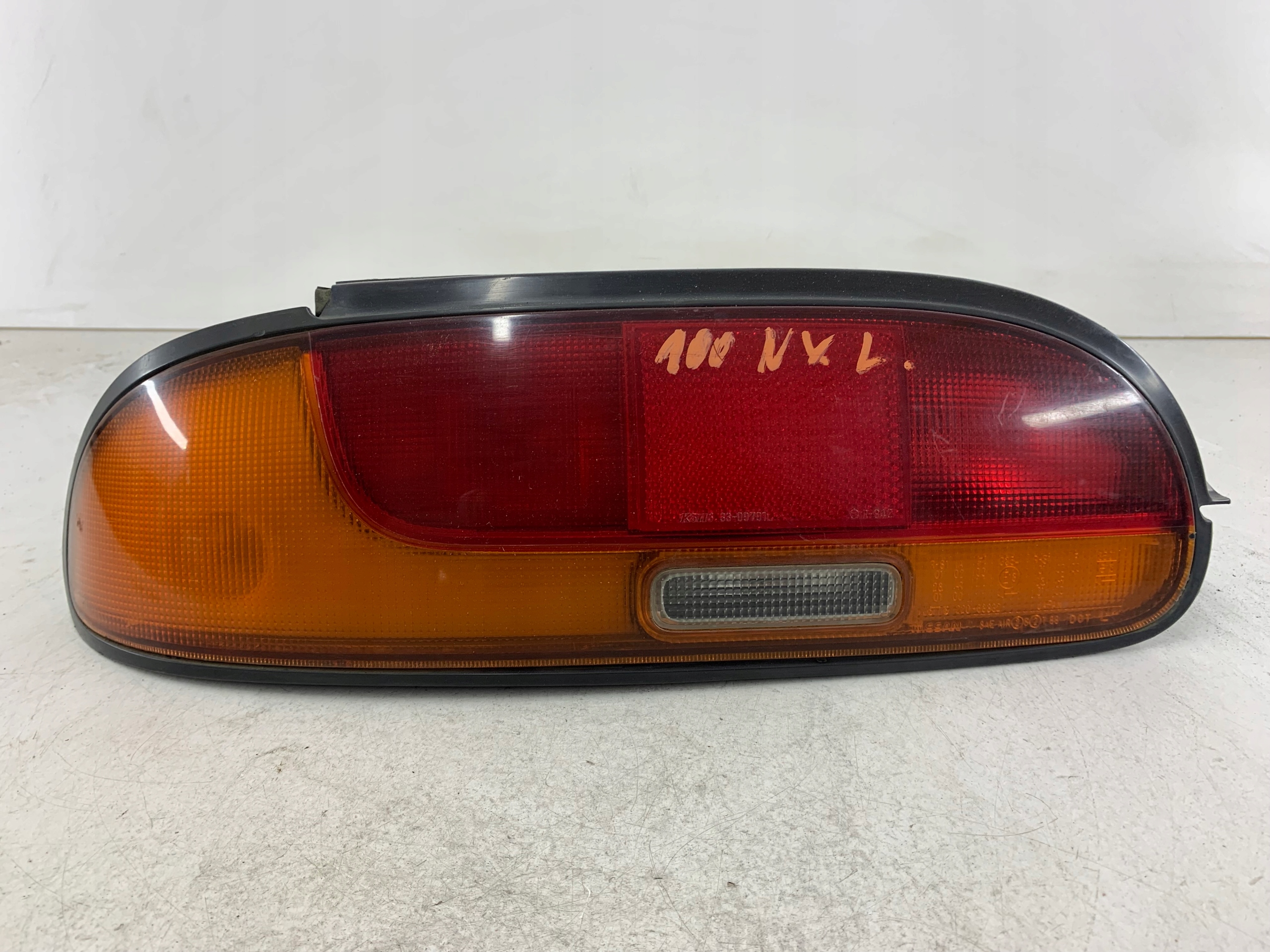 Dodatkowe zdjęcie używanej części: NISSAN 100NX LAMPA LEWA TYŁ