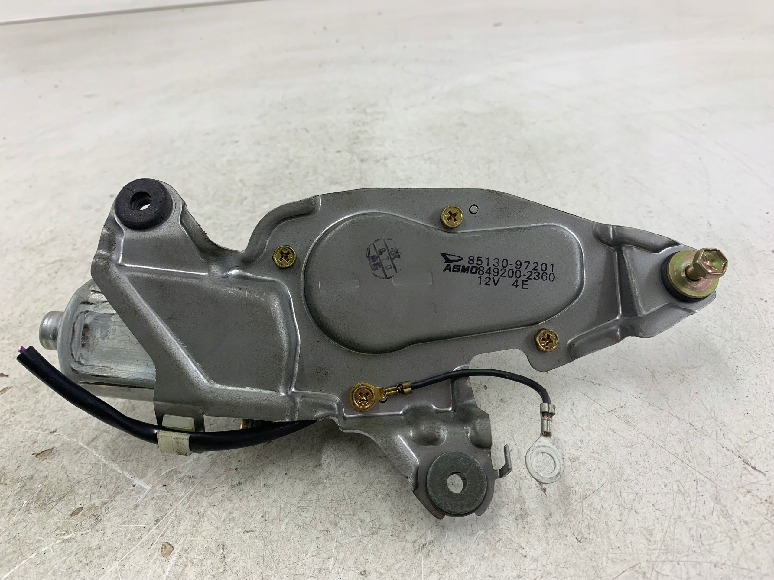 Dodatkowe zdjęcie używanej części: DAIHATSU SIRION MECHANIZM WYCIERACZKI TYŁ 85130-97201