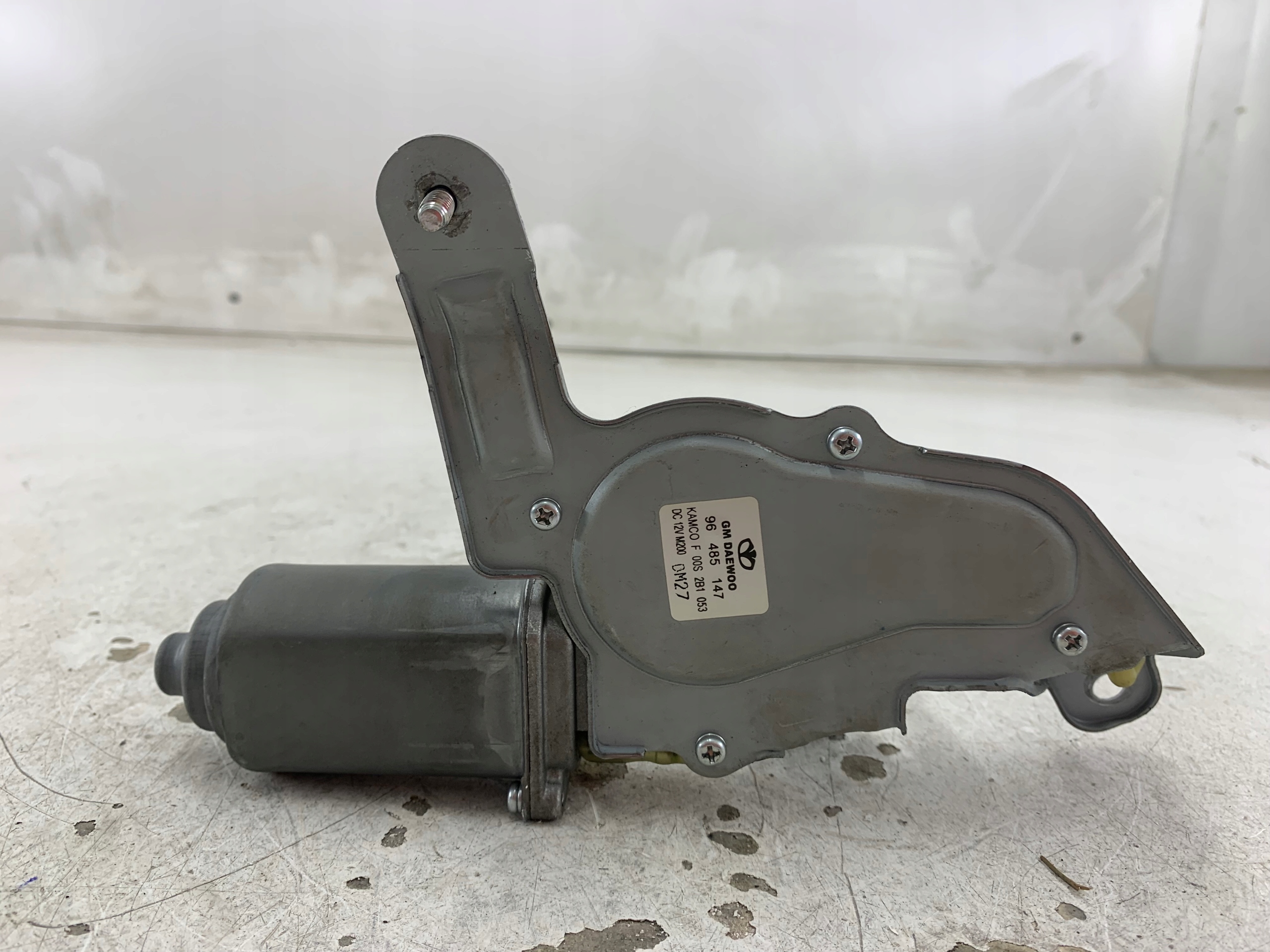 Dodatkowe zdjęcie używanej części: CHEVROLET MATIZ SPARK II MECHANIZM WYCIERACZEK TYŁ 96485147