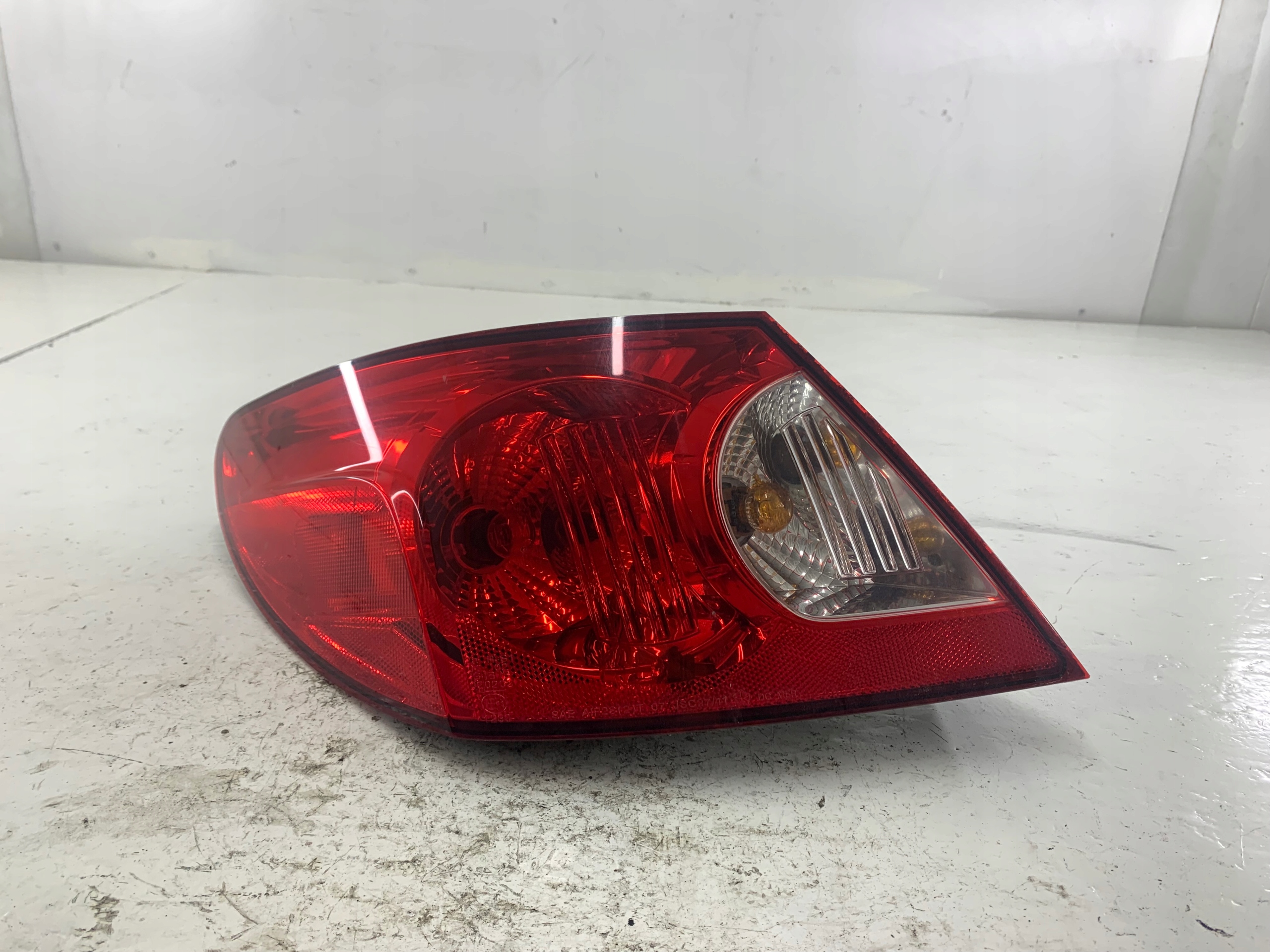 Dodatkowe zdjęcie używanej części: CHRYSLER SEBRING III LAMPA LEWA TYŁ