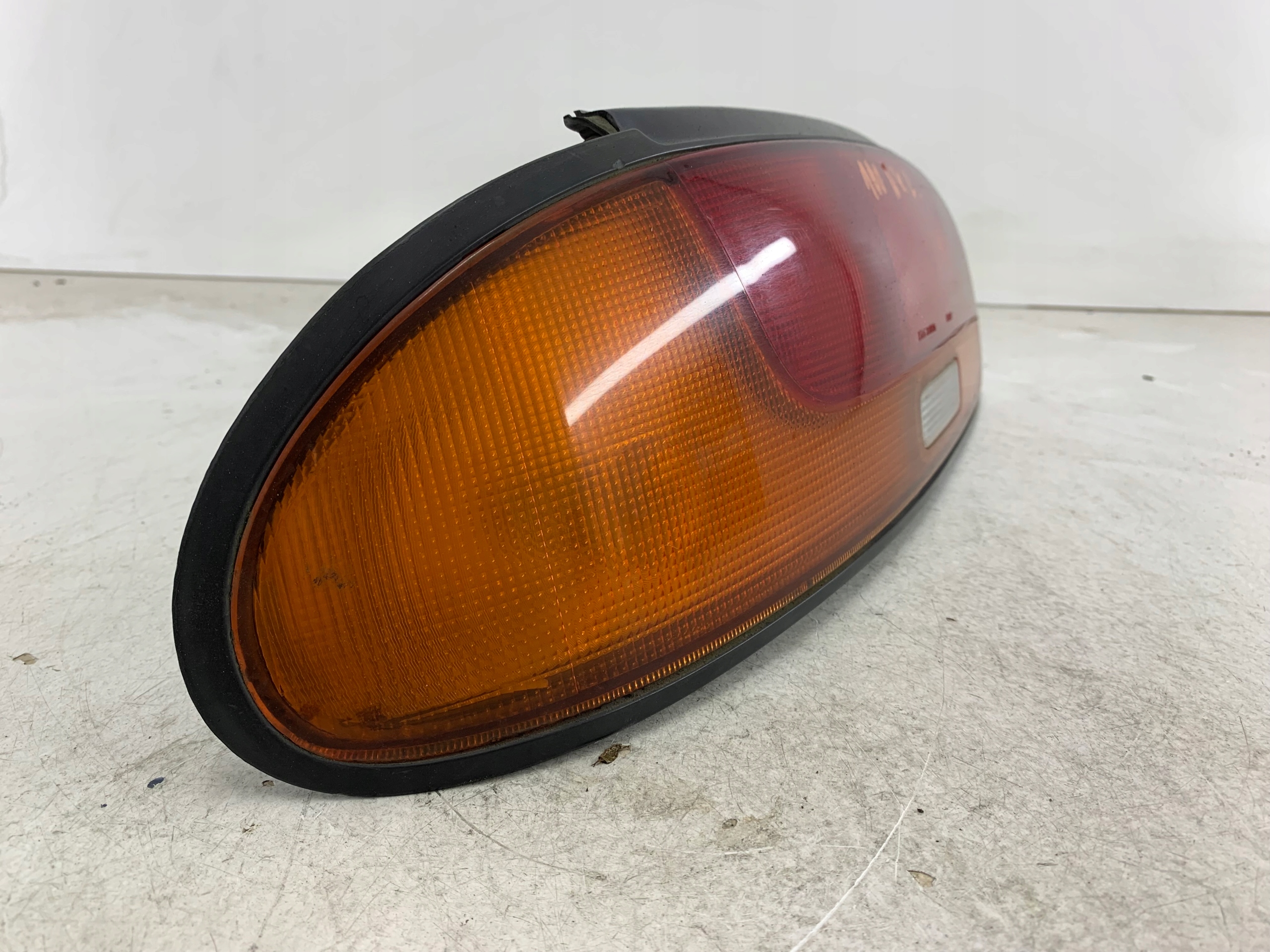 NISSAN 100NX LAMPA LEWA TYŁ - zdjęcie 2