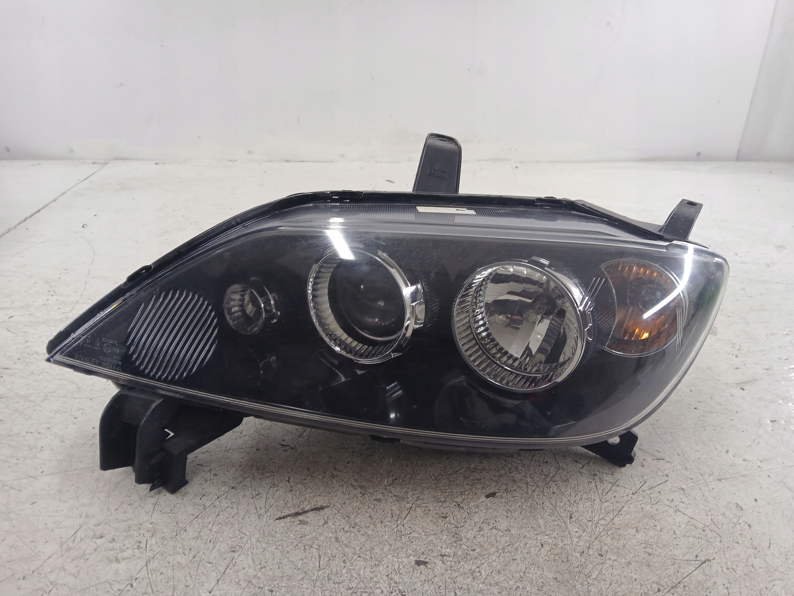 Dodatkowe zdjęcie używanej części: MAZDA 2 DY LIFT LAMPA LEWA PRZÓD