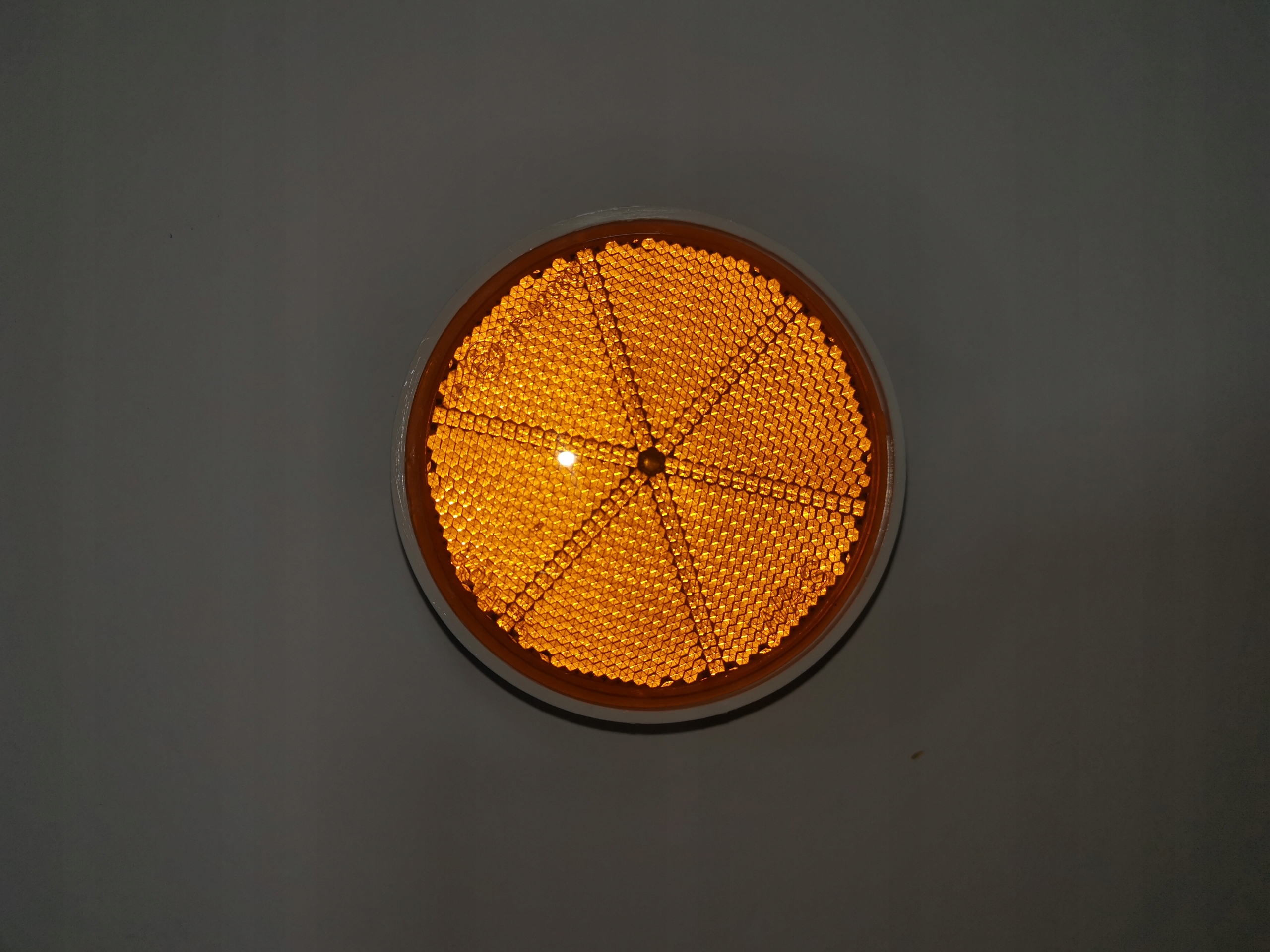 Koło odblask ostrzegawczy Pomarańcz Fi 75 śruba M5