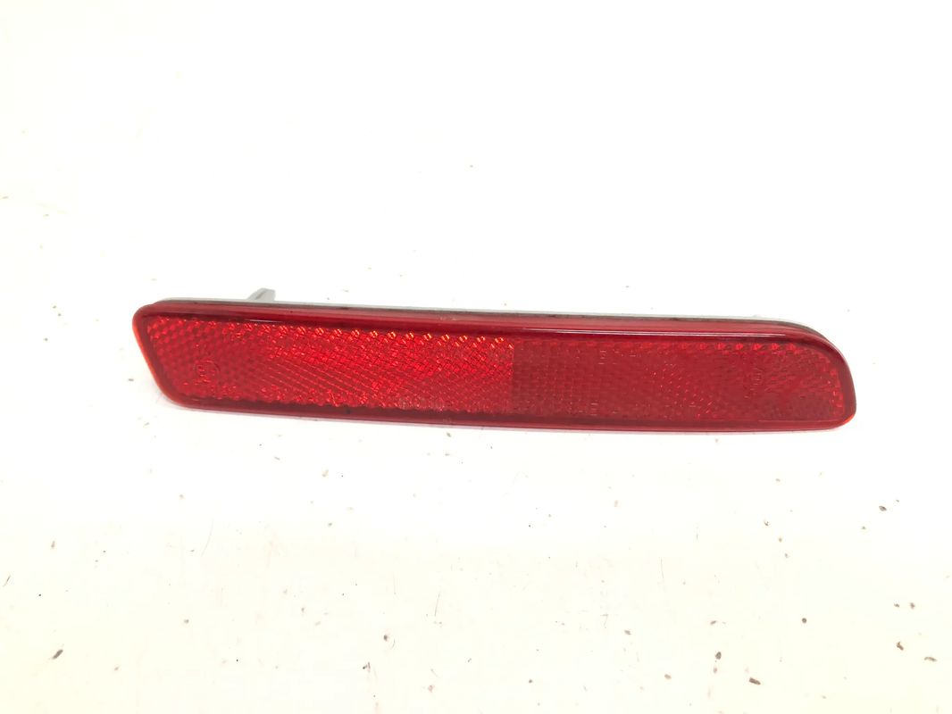 SUZUKI SX4 2006- LAMPA ODBLASK ZDERZAKA TYLNY LEWY  / DARMOWA DOSTAWA