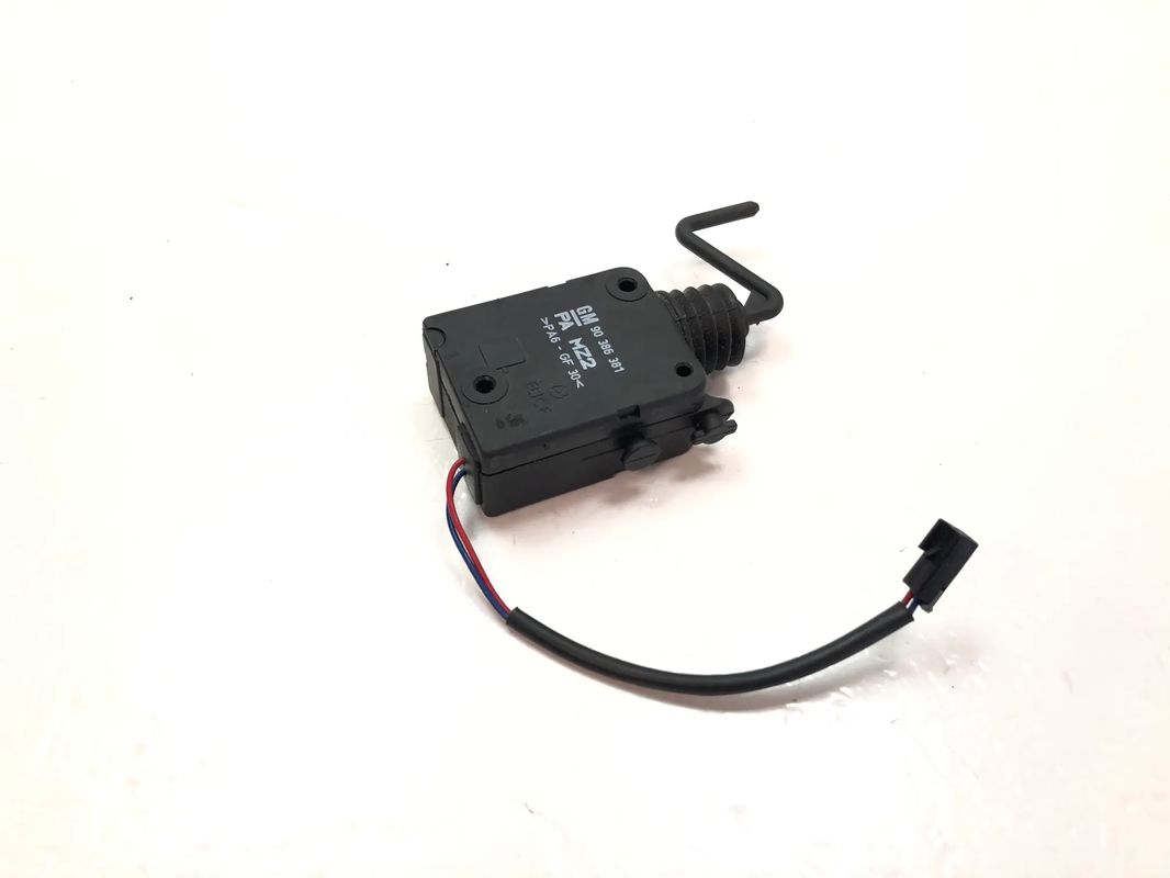 OPEL CORSA B 1993-2000 SIŁOWNIK KLAPKI WLEWU PALIWA / NOWY / ORYGINAŁ / 90386381