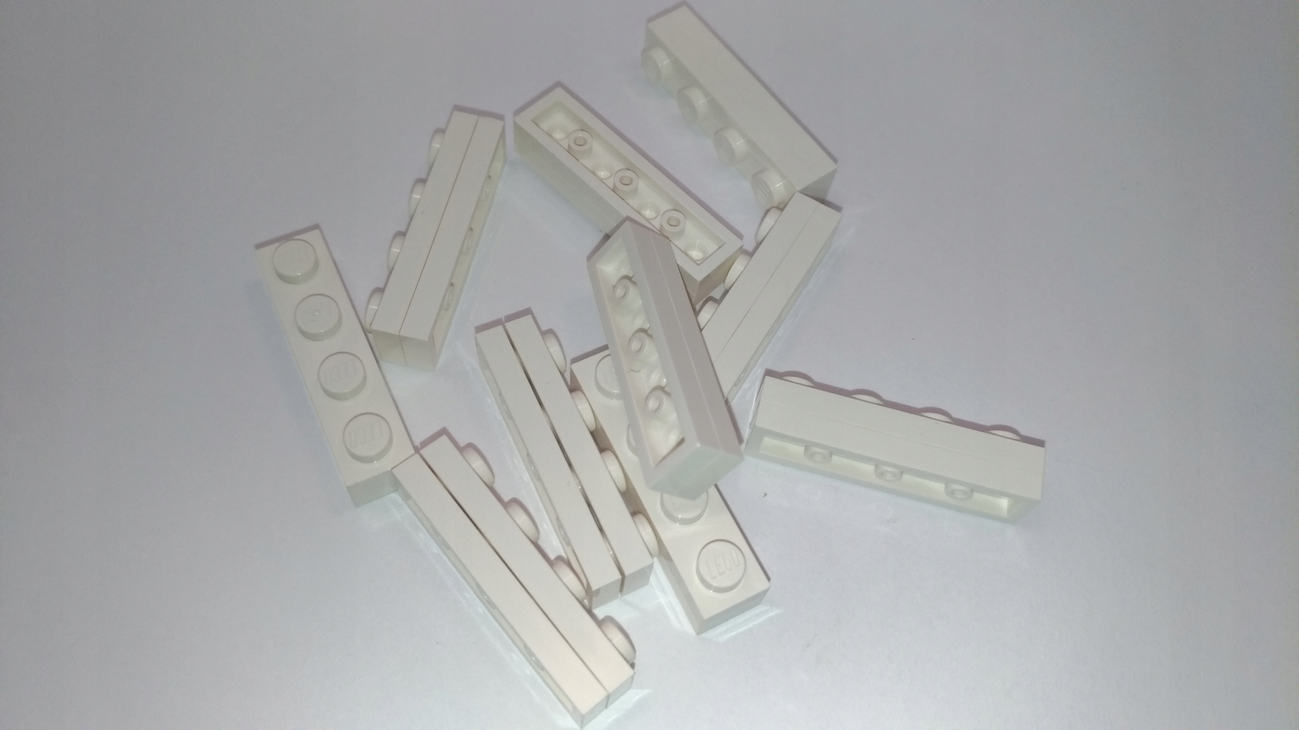 185k. LEGO 3710 biale 1x4 - 20 sztuk 2 1976266b6ddfc01c6990fd0822ba74e7