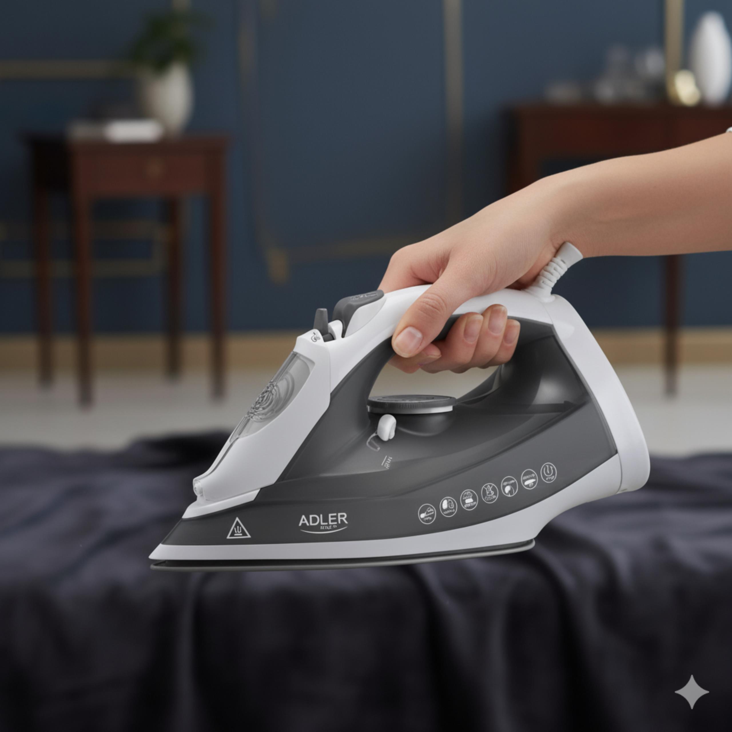 Żelazko Adler AD 5051 używane do prasowania parowego w pionie na wiszącej koszuli.