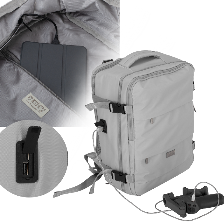 Plecak Camry CR 6880 z widocznymi portami ładowania USB-A i USB-C oraz laptopem i akcesoriami wewnątrz, symbolizujący mobilne biuro.