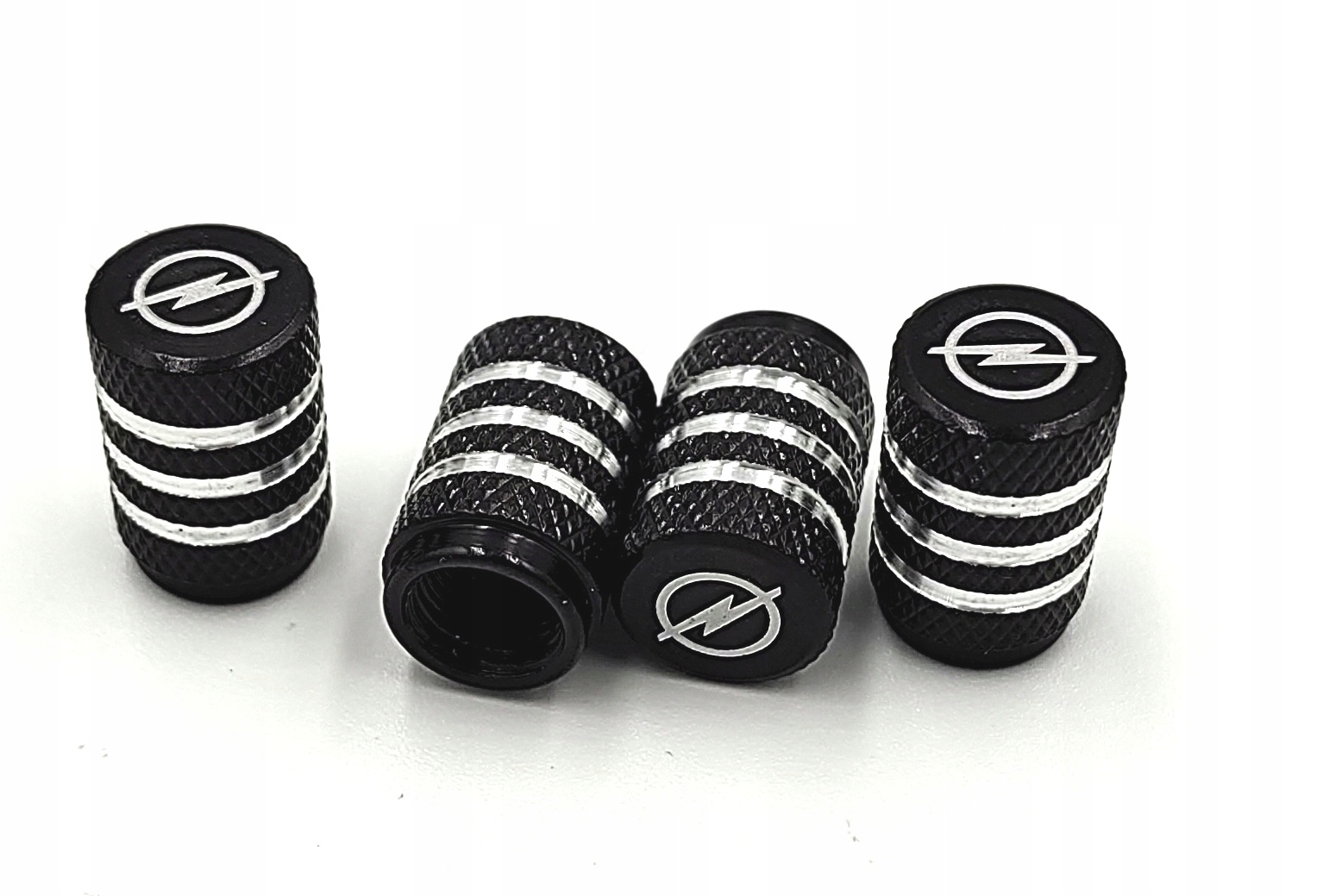 OPEL nakrętki na wentyle ALUMINIOWE kapturki OPEL wentylki 4szt. CZARNE