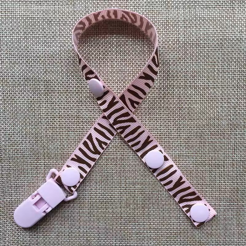 zawieszka do smoczka różowa zebra wymiary i regulacja długości